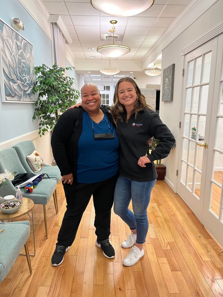 Cash Now Philly team member with a client